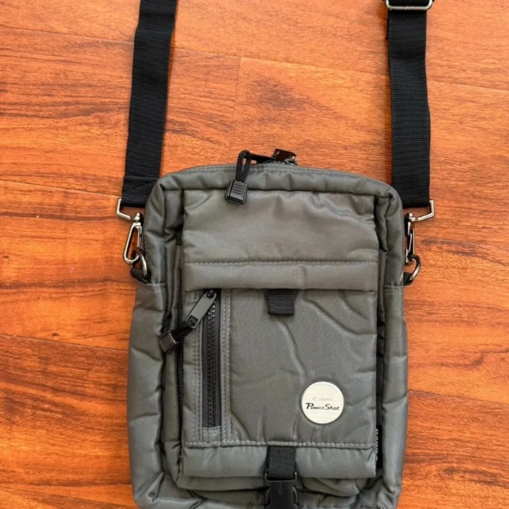 Gray Crossbody Bag with Black Strap